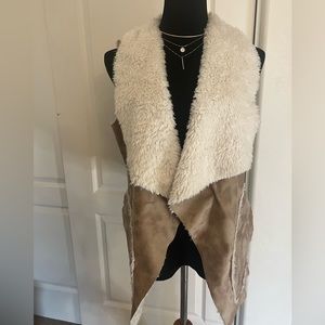 American Rag tan fur lined vest. Size Large